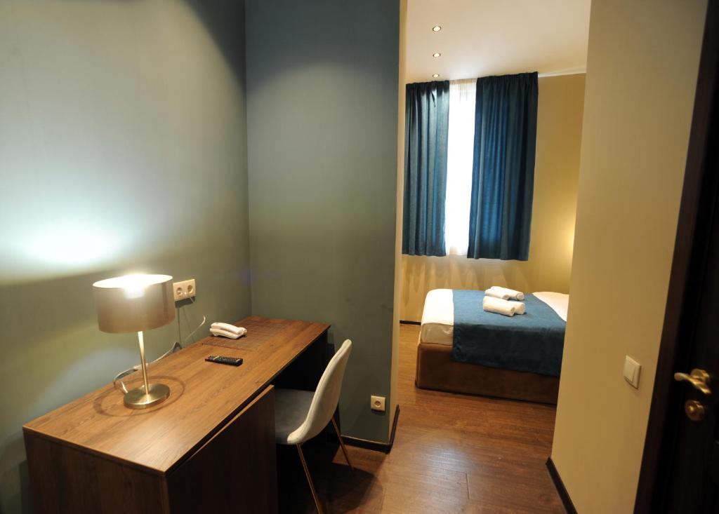 Postel nebo postele na pokoji v ubytování Hotel Verisima