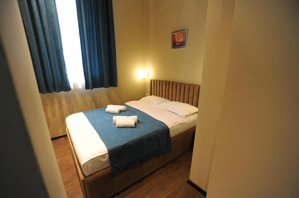 Postel nebo postele na pokoji v ubytování Hotel Verisima