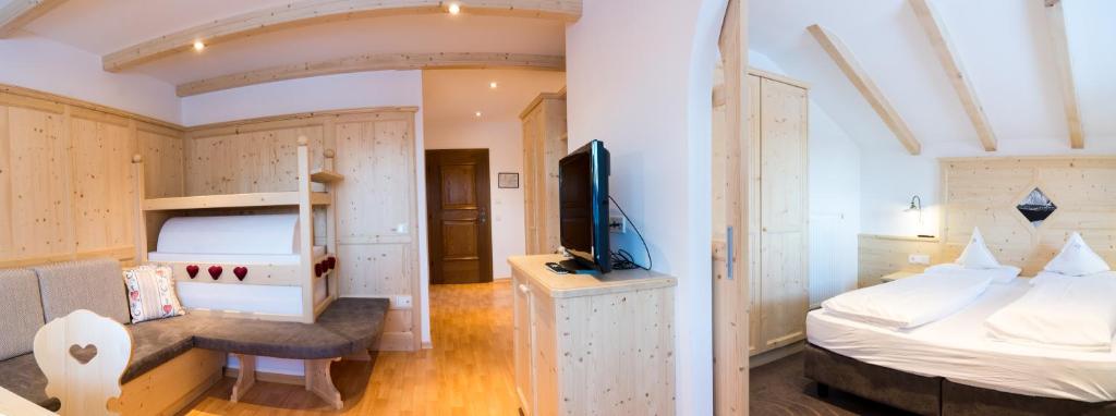 Postel nebo postele na pokoji v ubytování Hotel Alaska