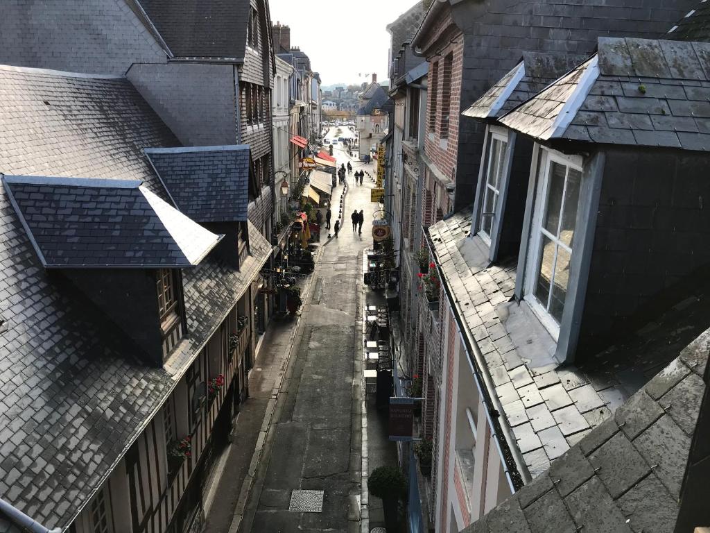 an overhead view of a city street with buildings at Le Studio du Gouverneur in Honfleur
