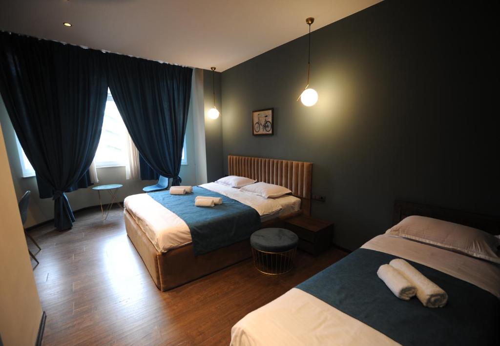 Postel nebo postele na pokoji v ubytování Hotel Verisima