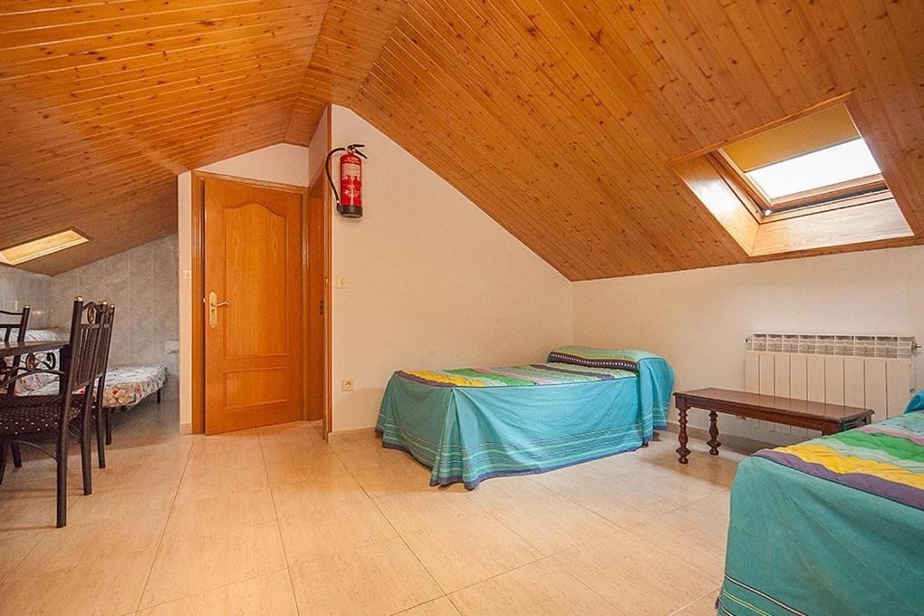 Posteľ alebo postele v izbe v ubytovaní Hostal Vinuesa