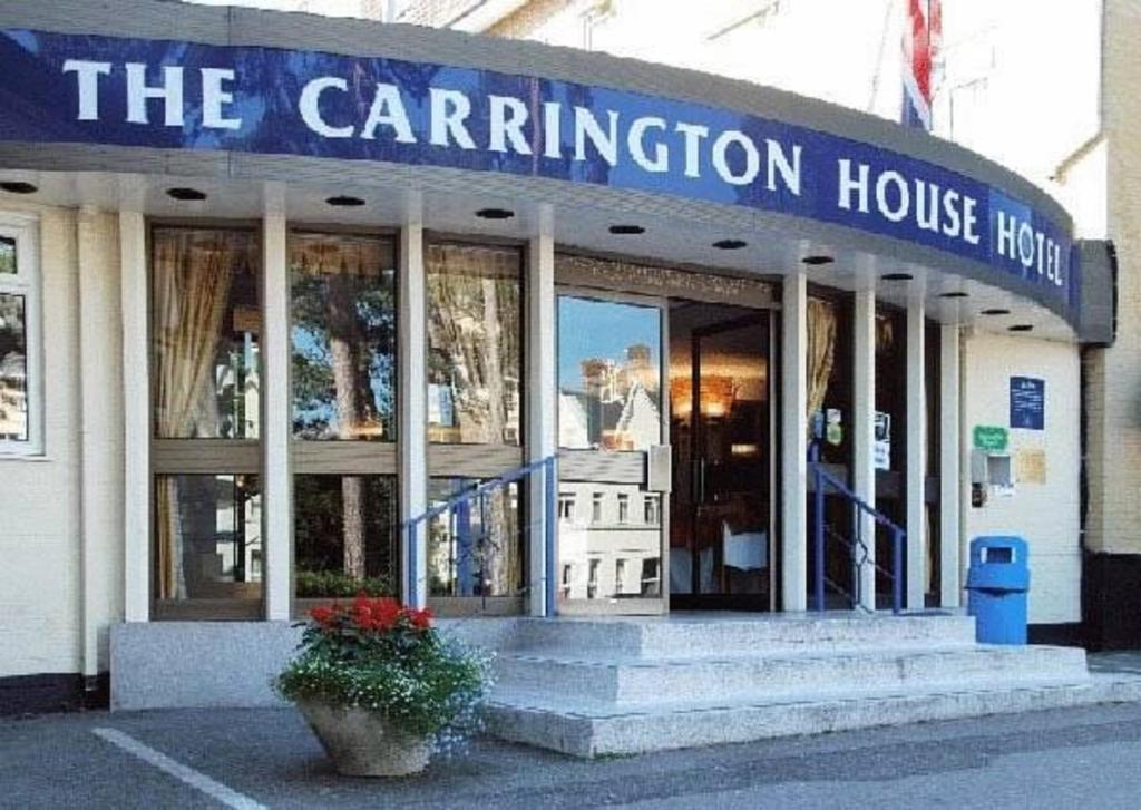 a building with the entrance to a carillion house at Carrington House Hotel in Bournemouth