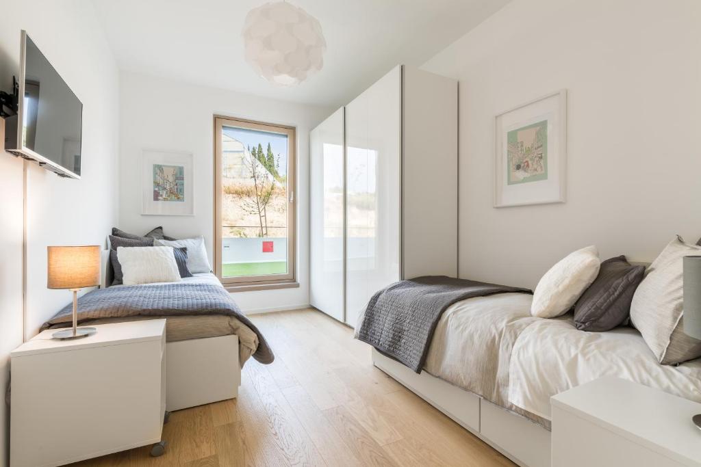 Posteľ alebo postele v izbe v ubytovaní The Majestic Bel Etage Upscale Apartment with Pool