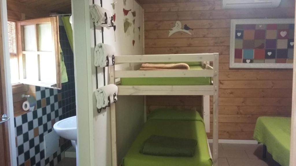 Postel nebo postele na pokoji v ubytování casa di campagna dal pozzo