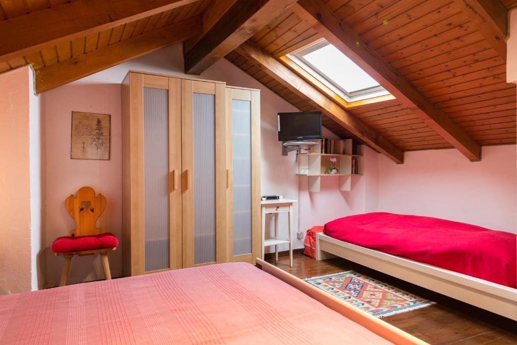 Postel nebo postele na pokoji v ubytování CORTE DI CAVNE'