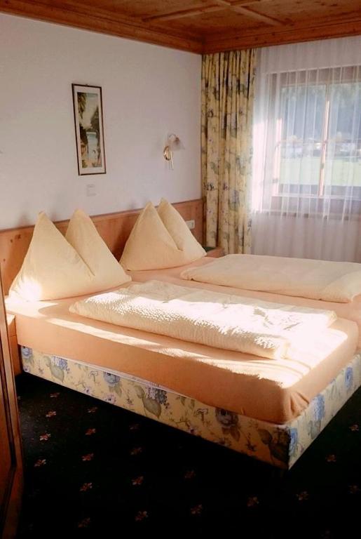 Postel nebo postele na pokoji v ubytování Gasthof Finkenhof