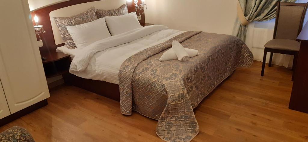 Postel nebo postele na pokoji v ubytování Apartment nr. 8