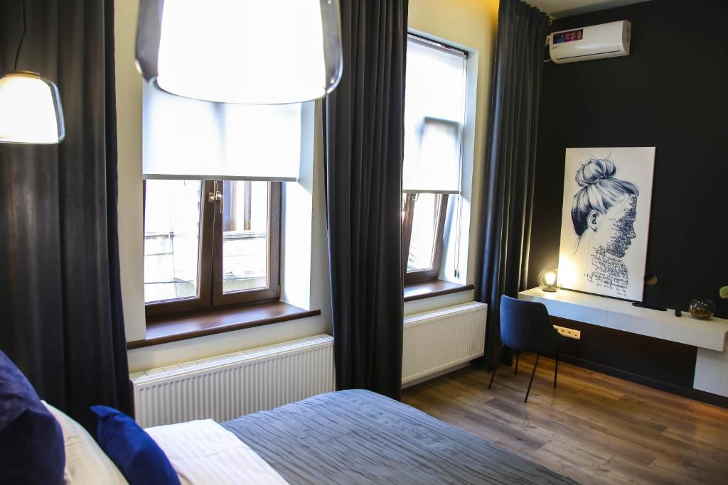 Postel nebo postele na pokoji v ubytování Apart Hotel на Трояндовой