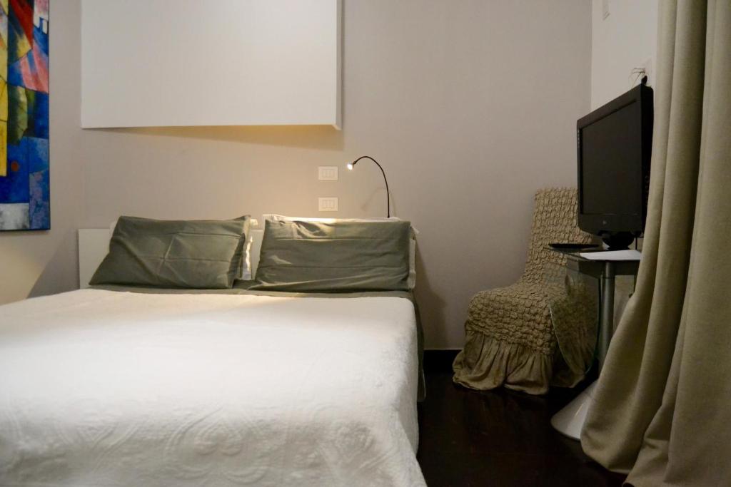 Postel nebo postele na pokoji v ubytování Atmosfere Puniche b&b