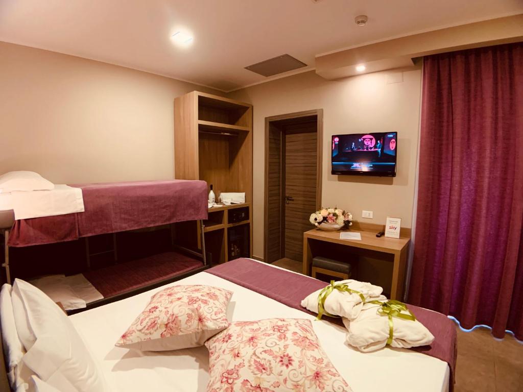 TV a/nebo společenská místnost v ubytování Hotel Smeraldo