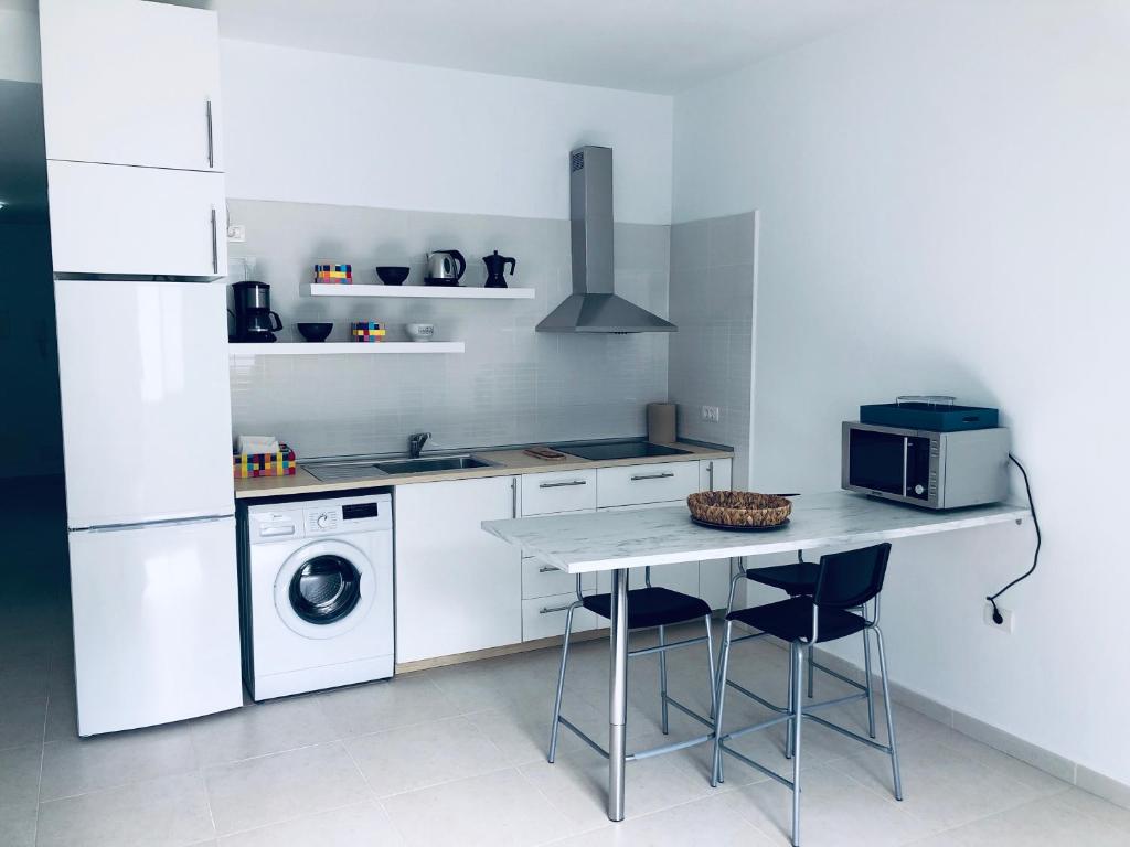 Virtuvė arba virtuvėlė apgyvendinimo įstaigoje Suite ladybird