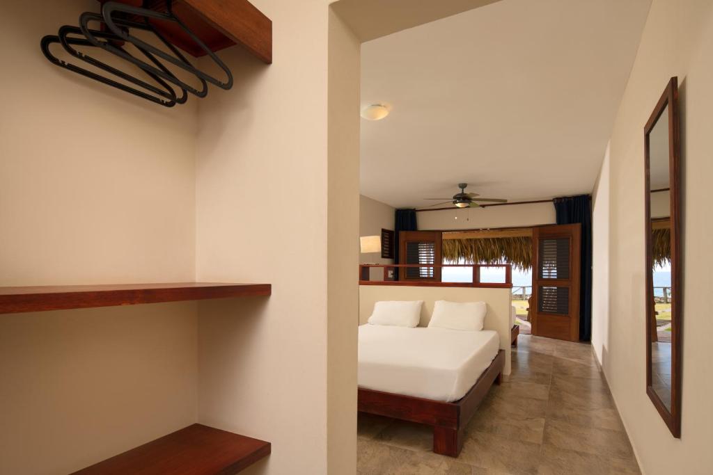 Postel nebo postele na pokoji v ubytování Hotel Bocaino