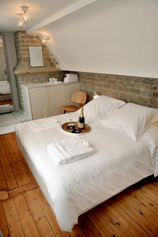 Postel nebo postele na pokoji v ubytování Guesthouse Bernardin