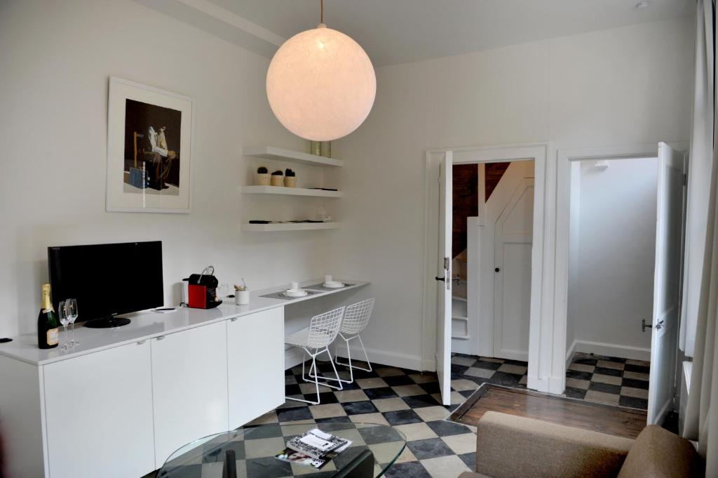 TV a/nebo společenská místnost v ubytování Guesthouse Bernardin