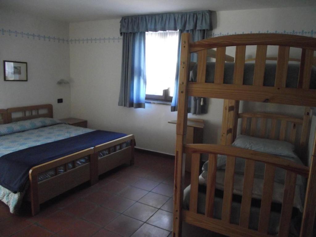 Letto o letti in una camera di Maso La Vecchia Quercia