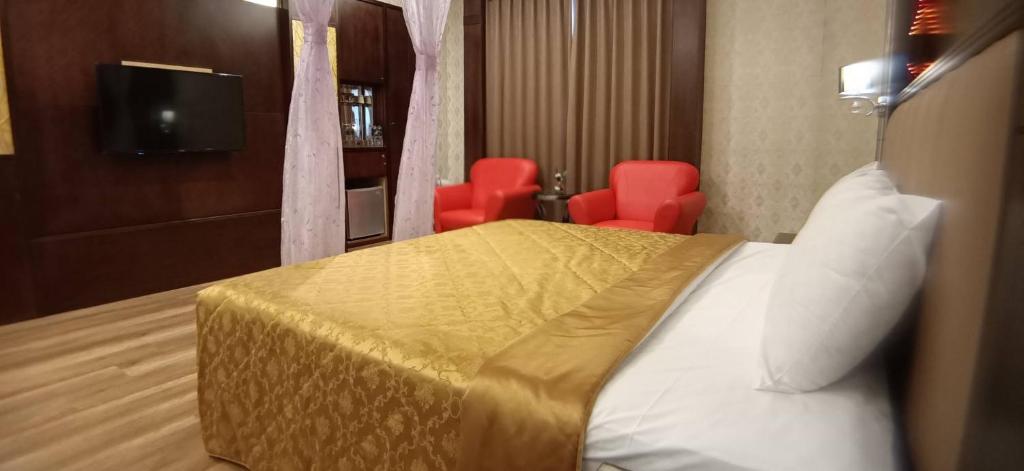 TV a/nebo společenská místnost v ubytování Wen Mei Motel