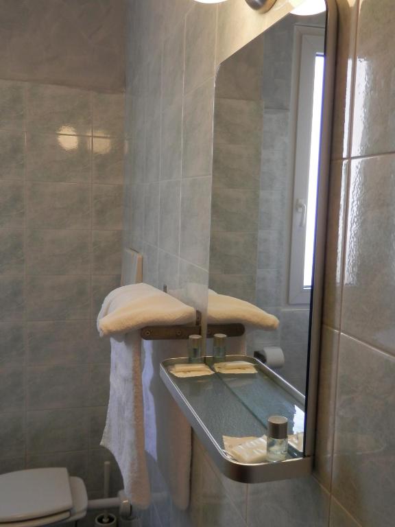 Koupelna v ubytování Albergo Posta