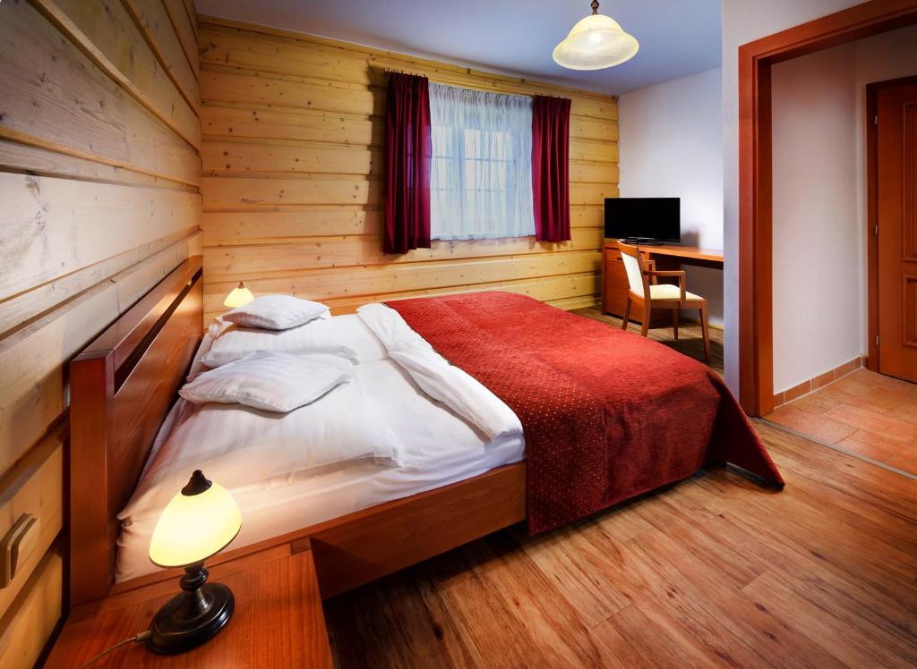 Postel nebo postele na pokoji v ubytování Green Inn Hotel