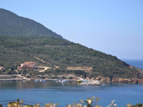 a view of a large body of water with a mountain at Roc A Mare in Galeria
