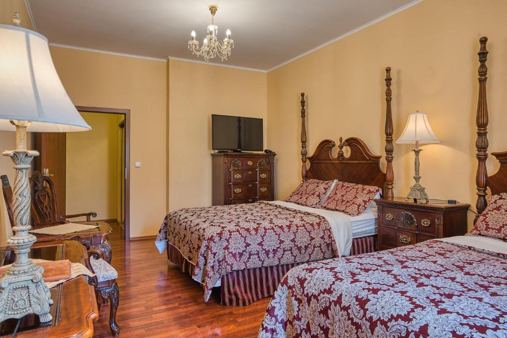 Cama o camas de una habitación en Hotel Royal
