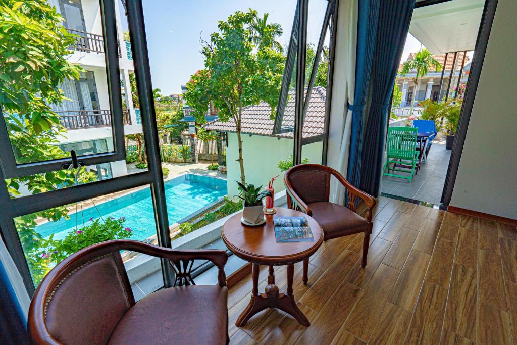 Golden Star Villa Hoi An - Deluxe Double O Twin Room Con Vista A La Piscina