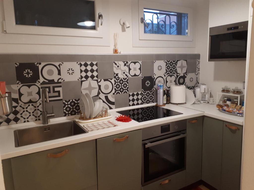 Kuchyň nebo kuchyňský kout v ubytování B&b Campus