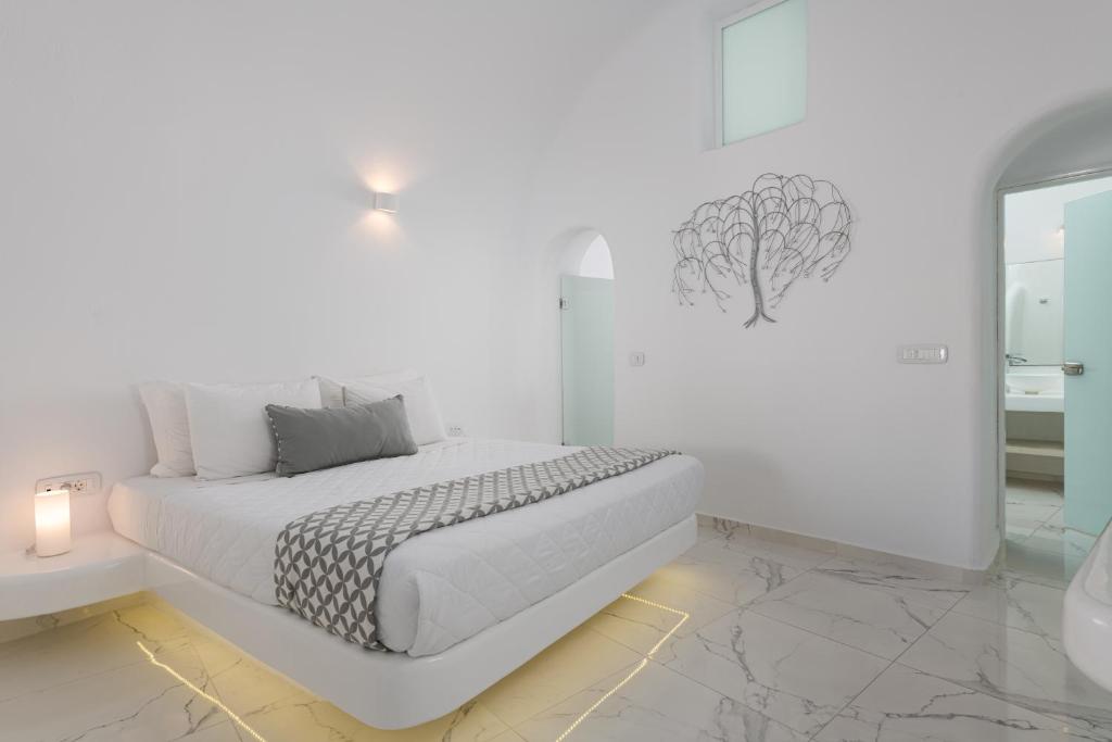 Postel nebo postele na pokoji v ubytování White Concept Caves