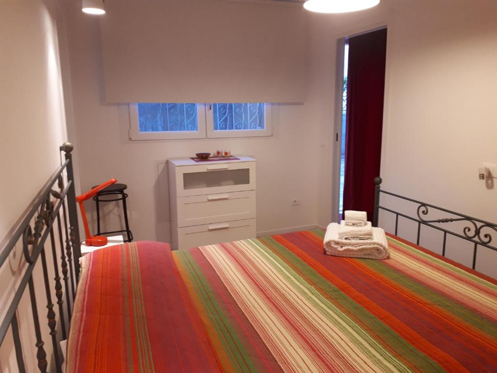 Postel nebo postele na pokoji v ubytování B&b Campus