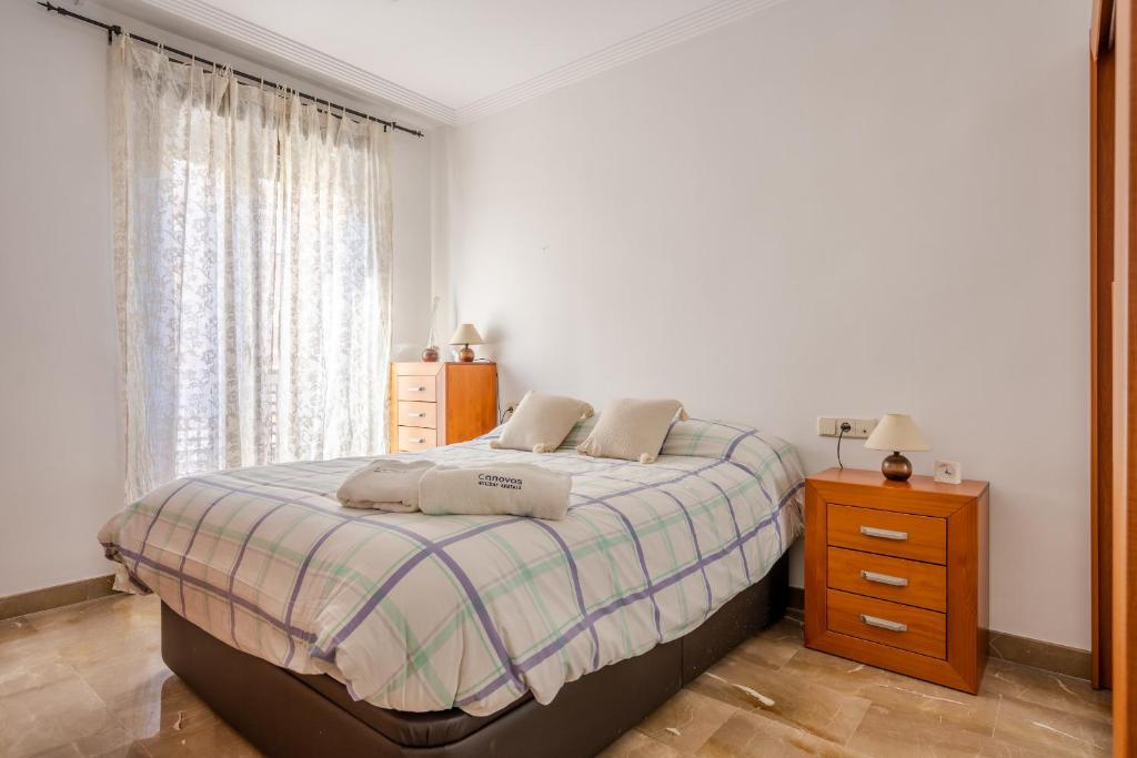 Katil atau katil-katil dalam bilik di Flex Apartment Granada by A3Rentals