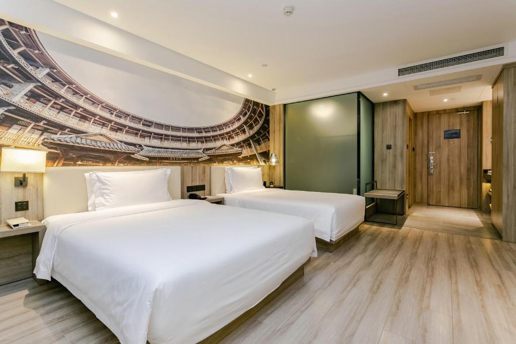 Postel nebo postele na pokoji v ubytování Atour Hotel Chengdu Shuangliu International Airport