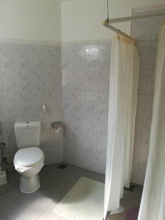 Koupelna v ubytování Ayubowan Guesthouse