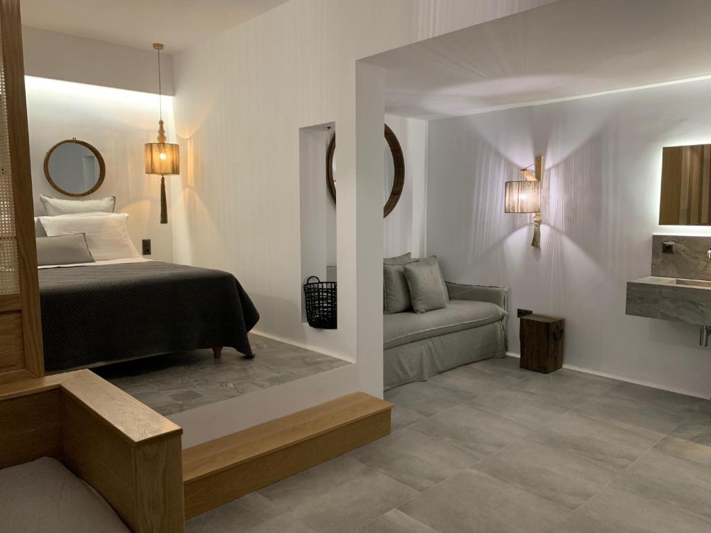Postel nebo postele na pokoji v ubytování Athina Studios and Suites Plaka