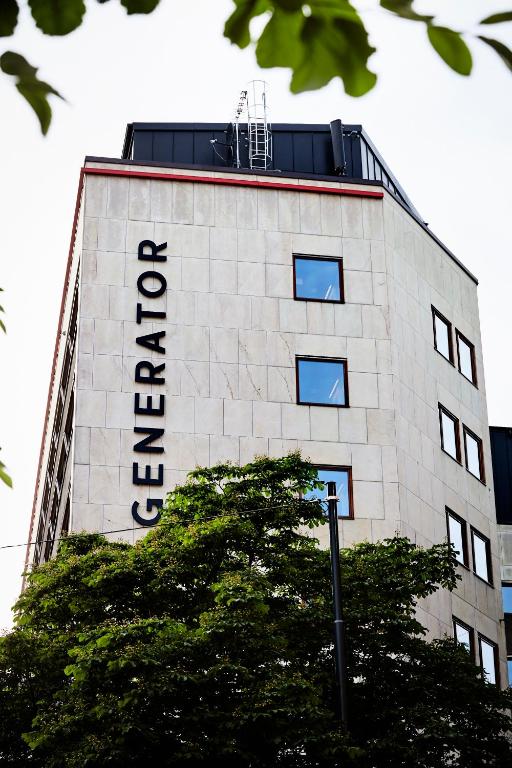 a building with a sign on the side of it at Generator Stockholm in Stockholm