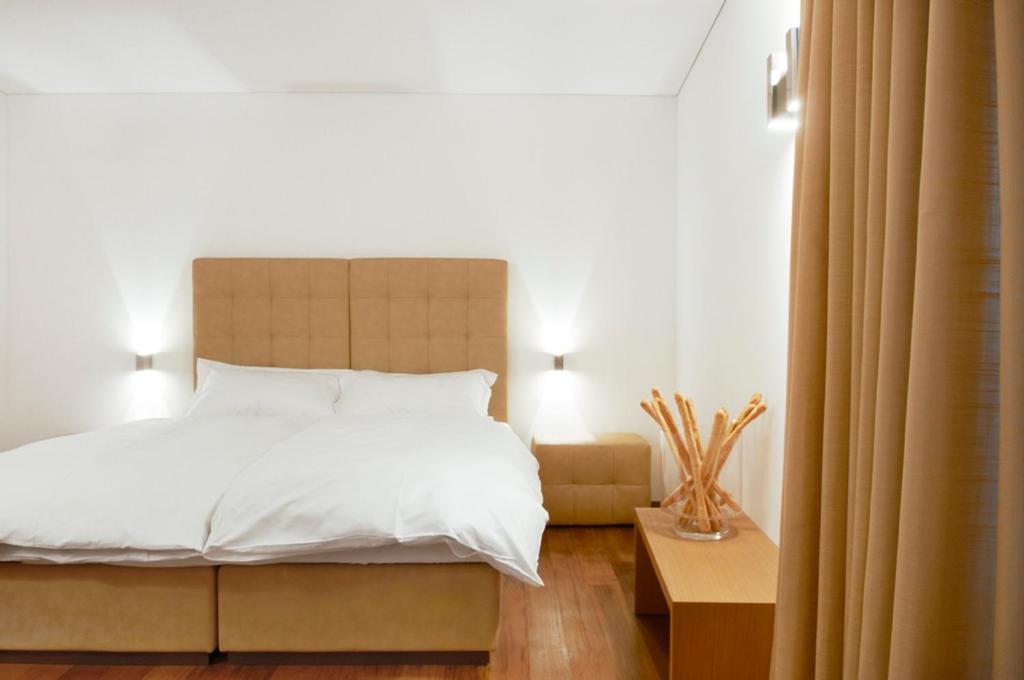 Vuode tai vuoteita majoituspaikassa Hotel Gabbani