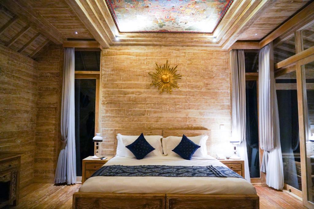Postel nebo postele na pokoji v ubytování Abian Taksu Suite & Villas