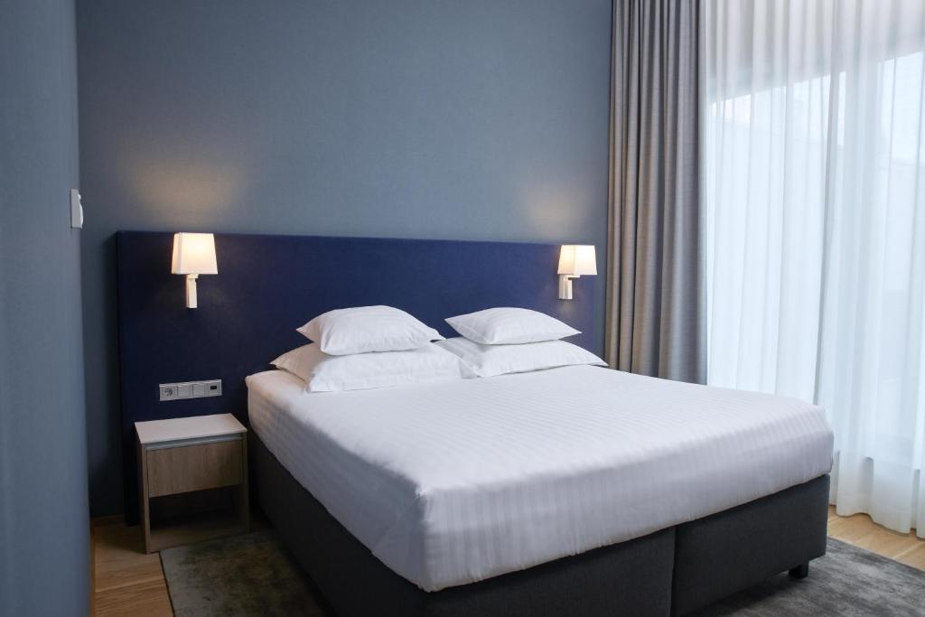 Voodi või voodid majutusasutuse Tallink Spa & Conference Hotel toas