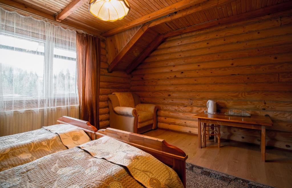 Giường trong phòng chung tại Hirskyy Svitanok