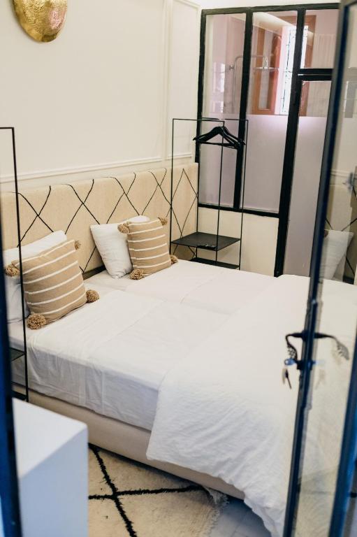 Postel nebo postele na pokoji v ubytování Riad Aïcha Kitchen
