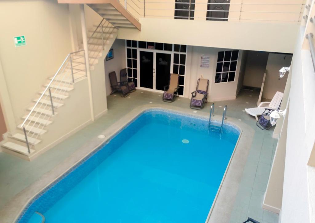 Bazén v ubytování Hotel Los Almendros nebo v jeho okolí