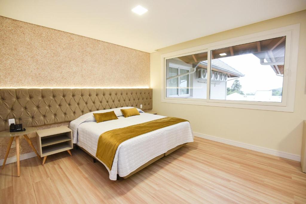 Ένα ή περισσότερα κρεβάτια σε δωμάτιο στο Hotel Alles Berg