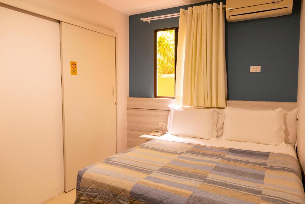 Postel nebo postele na pokoji v ubytování Pousada Mariluz