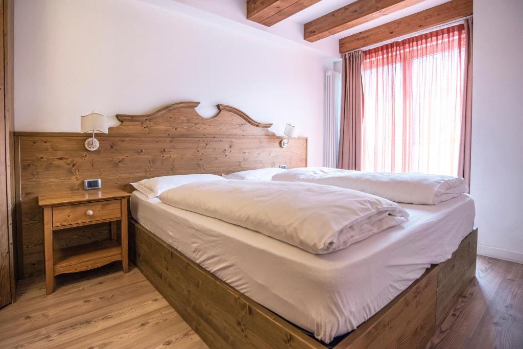 Postel nebo postele na pokoji v ubytování Hotel Resort Al Sole