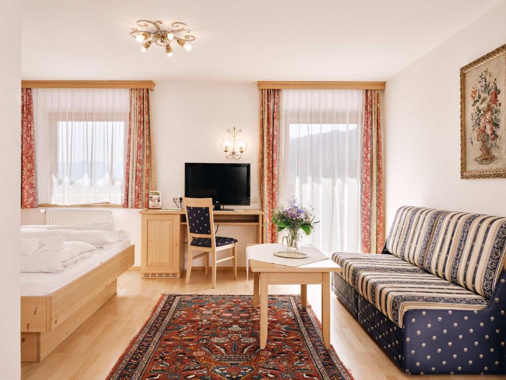 TV a/nebo společenská místnost v ubytování Hotel Blattlhof