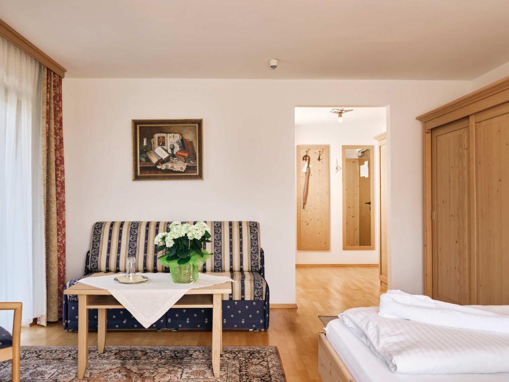 Postel nebo postele na pokoji v ubytování Hotel Blattlhof