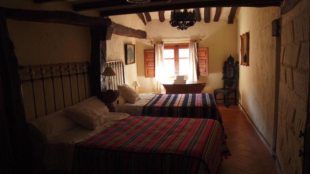 Postel nebo postele na pokoji v ubytování Casa rural Villapajar