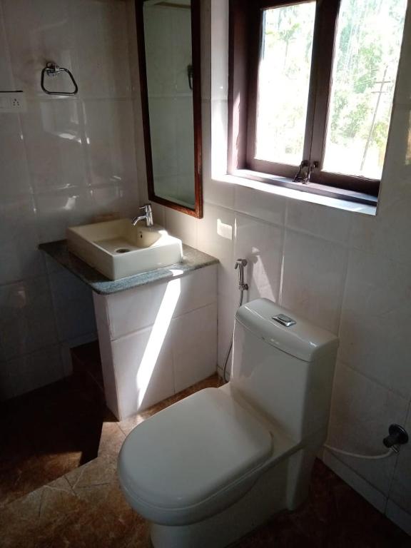 Koupelna v ubytování Kwality Estate