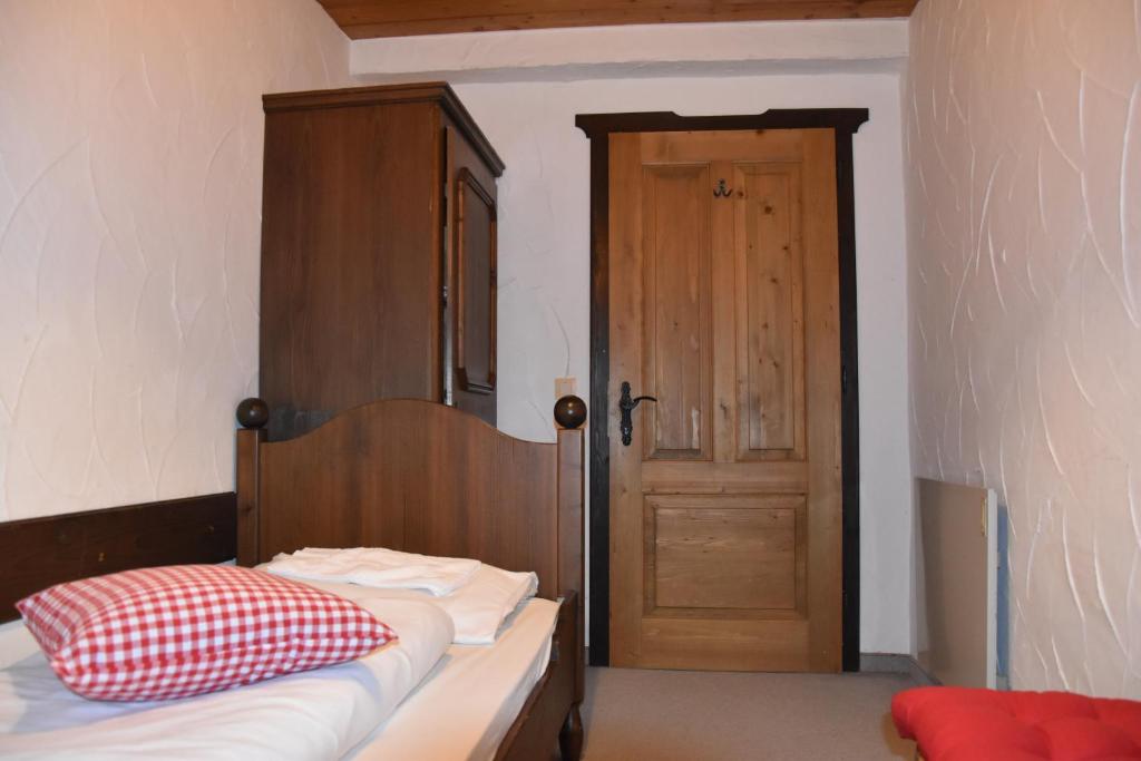 Postel nebo postele na pokoji v ubytování Apartment Julia Nassfeld