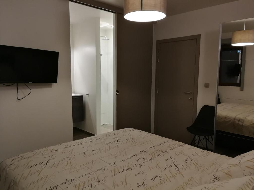 TV a/nebo společenská místnost v ubytování B&B Meulecauter