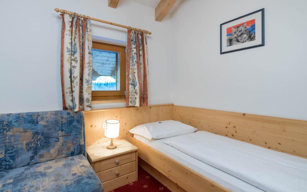Postel nebo postele na pokoji v ubytování Hotel Kaserhof
